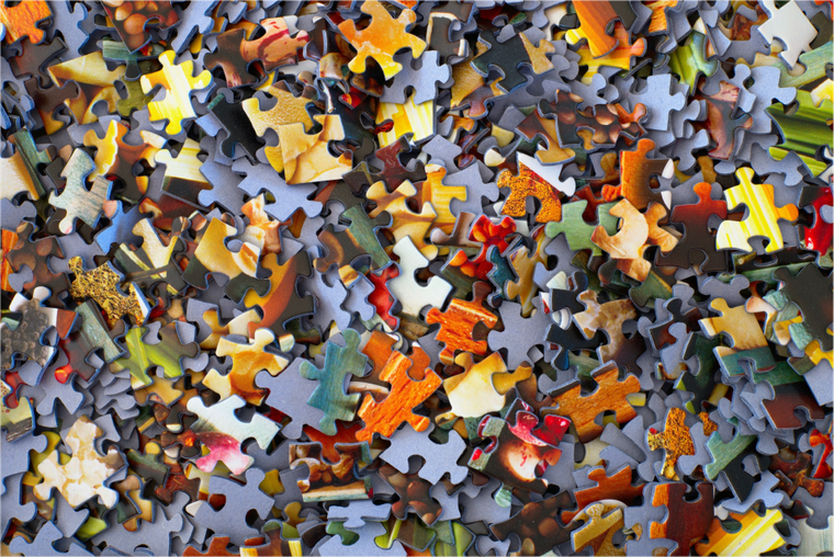 A pile of loose puzzle pieces